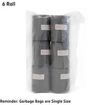 Packaged rolls of garbage bags with labels on a white background