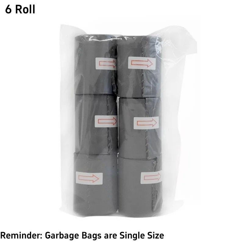 Packaged rolls of garbage bags with labels on a white background